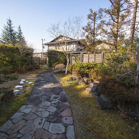 Tomiya Ryokusuian Sado-Taiken Pension Buitenkant foto